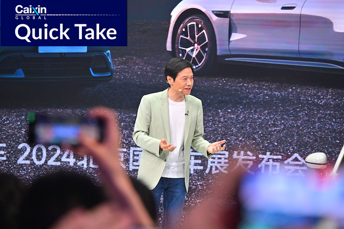 Lei Jun at an automotive show in Beijing on Thursday